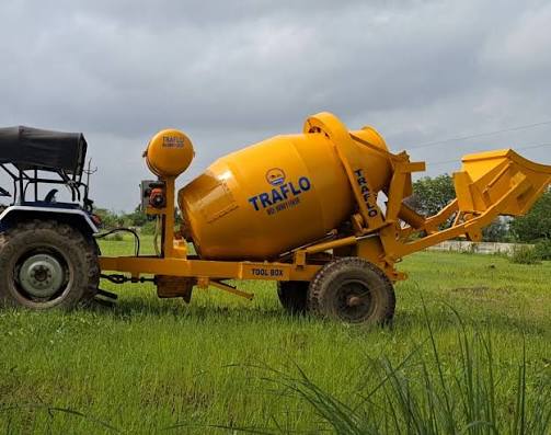 TRAFLO yellow mixer on tractor